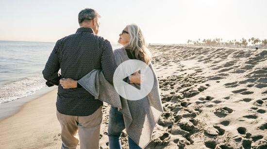 Couple walking on beach